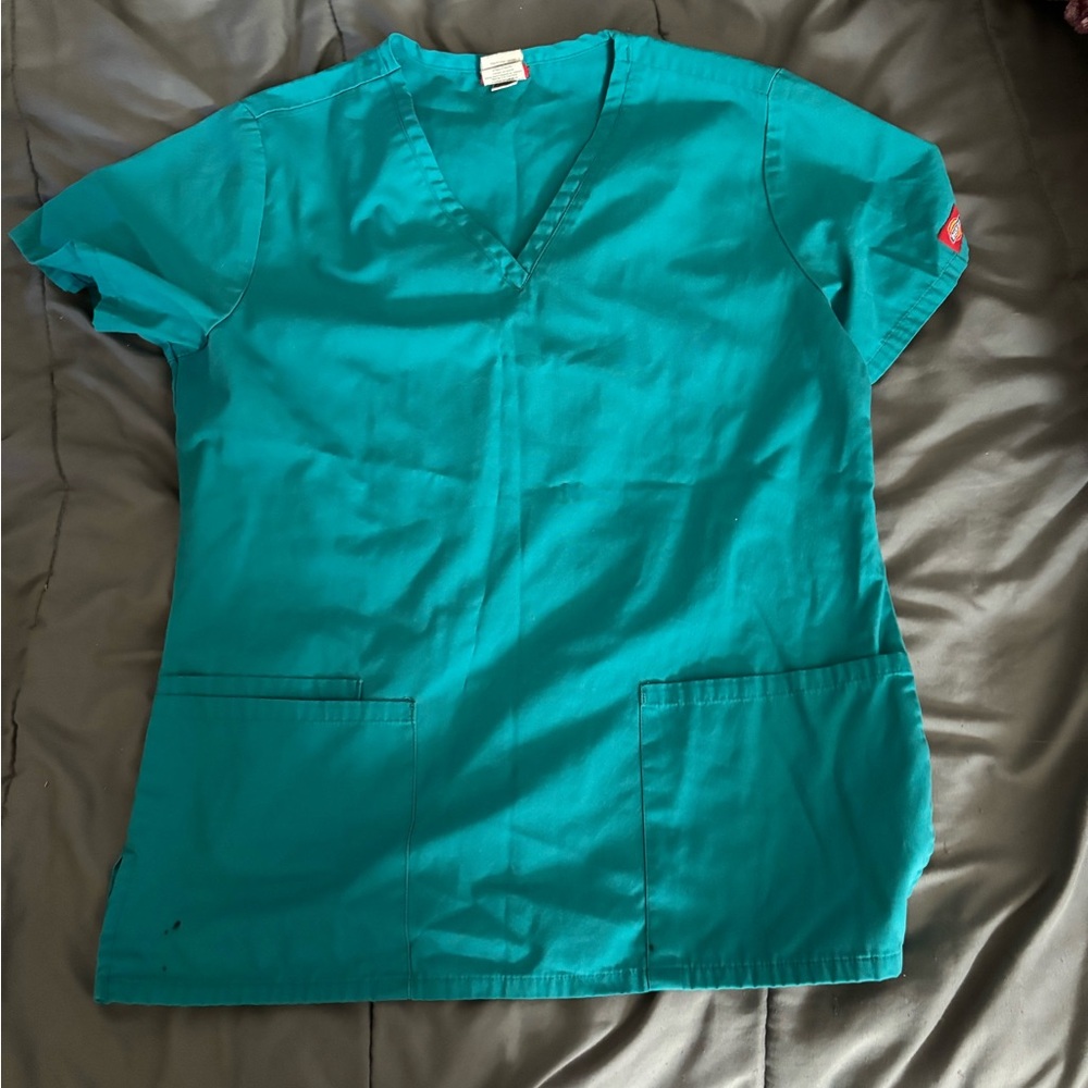 Assorted colored scrub tops